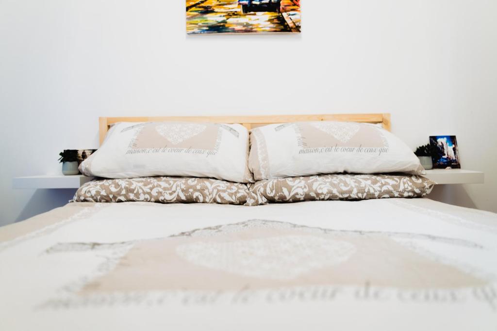 A bed or beds in a room at La Boutique del Vento - Esclusivo in pieno centro