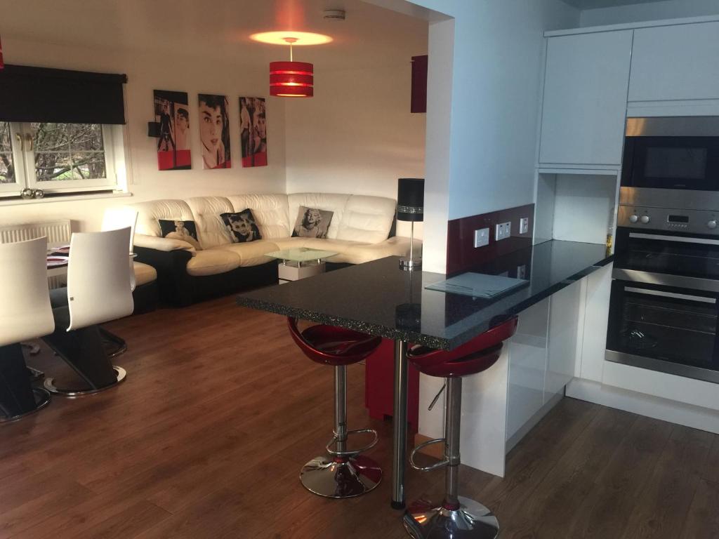 Kuchyň nebo kuchyňský kout v ubytování La Fortuna Lodges