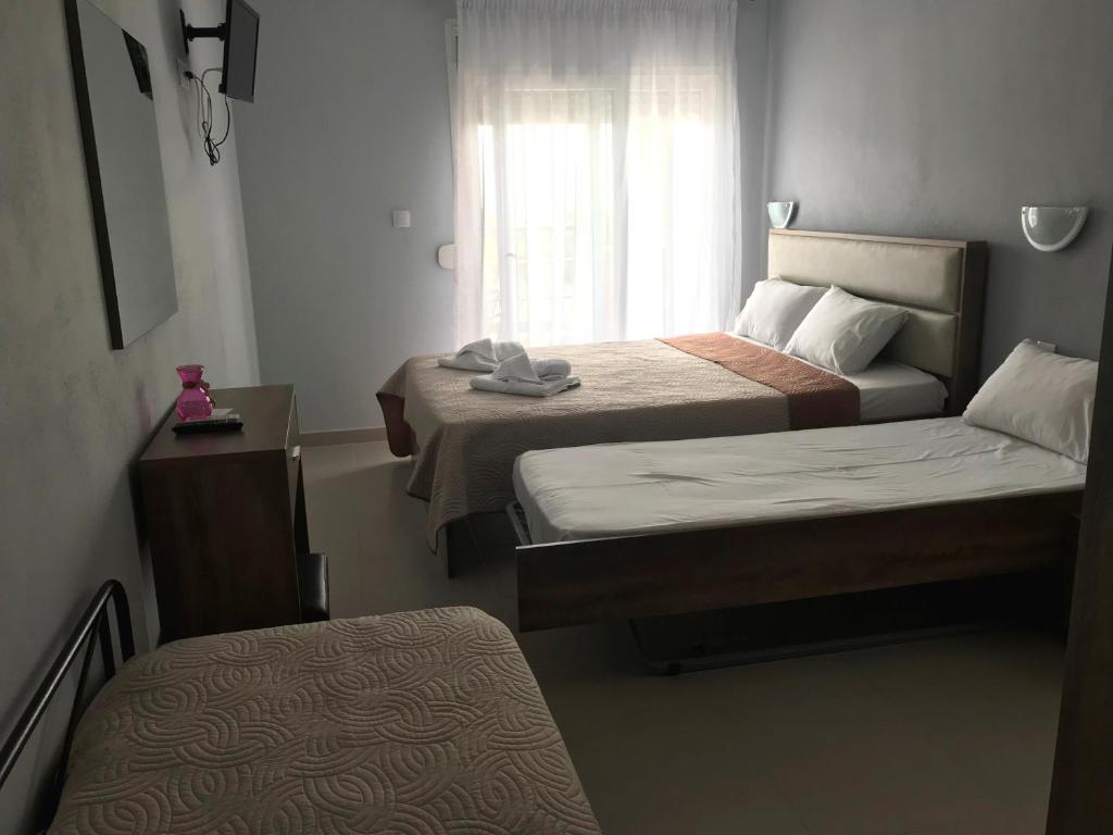 A bed or beds in a room at Littore Maris