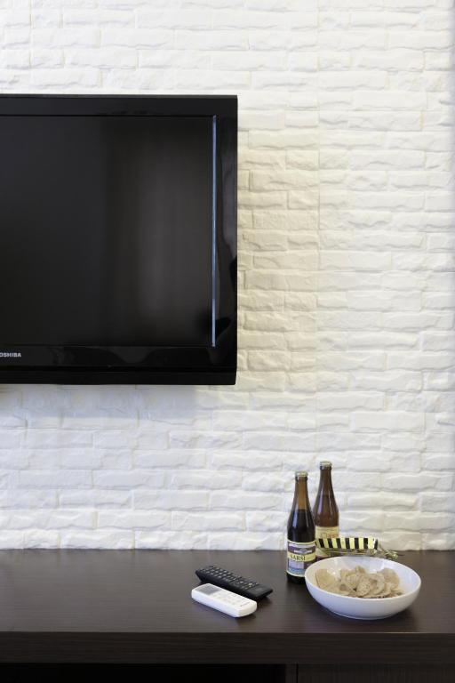 TV a/nebo společenská místnost v ubytování Arc1901 staycation