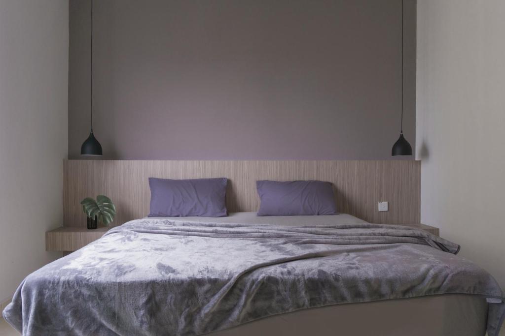 Postel nebo postele na pokoji v ubytování Arc1901 staycation