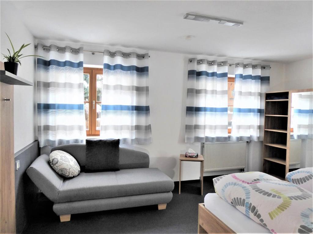 Postel nebo postele na pokoji v ubytování Gästehaus Sonner