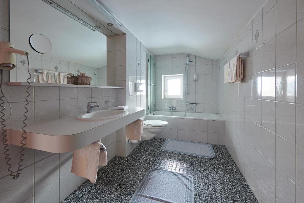 Ванная комната в Hotel Appartement Roggal