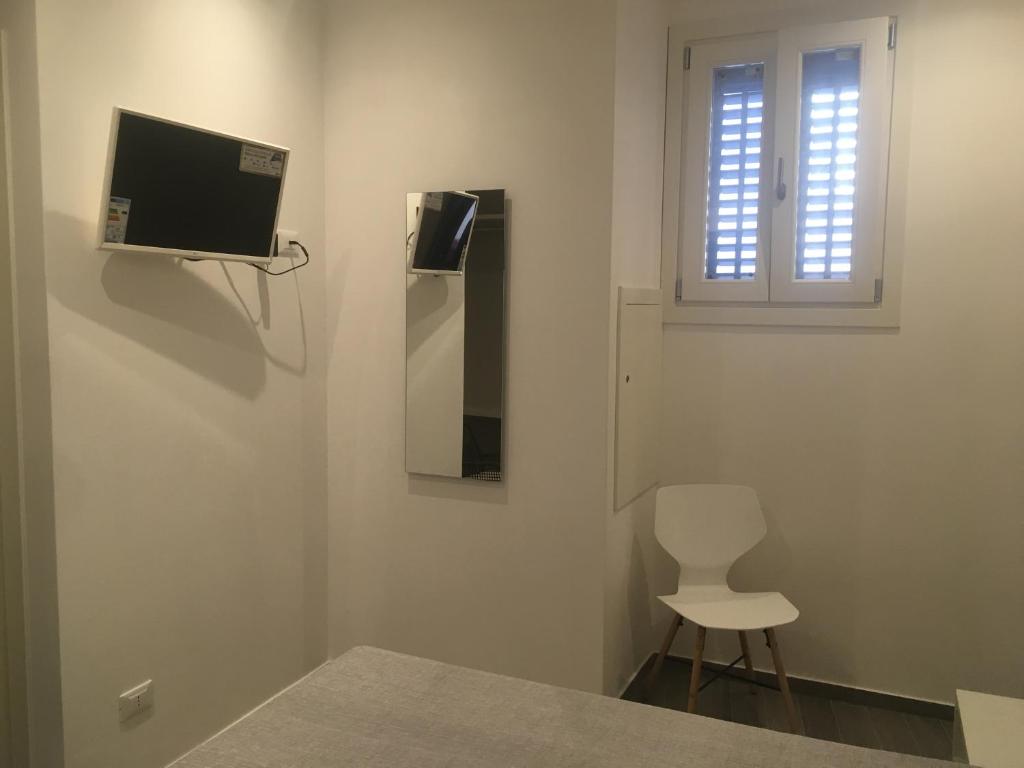 TV a/nebo společenská místnost v ubytování B&B Marconi