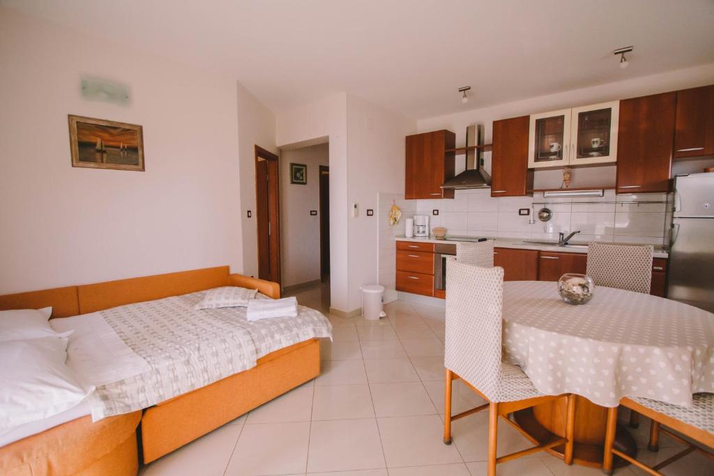 Kuchyň nebo kuchyňský kout v ubytování Apartments Jasna
