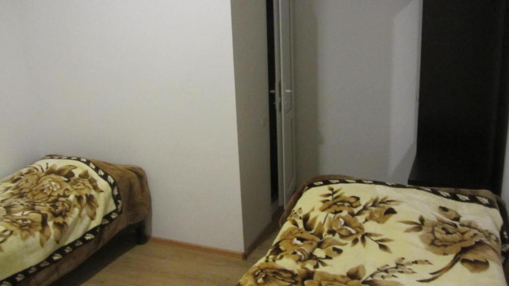 Postel nebo postele na pokoji v ubytování Guest House Adelina