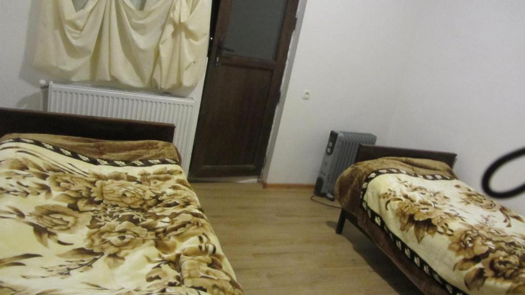 Postel nebo postele na pokoji v ubytování Guest House Adelina