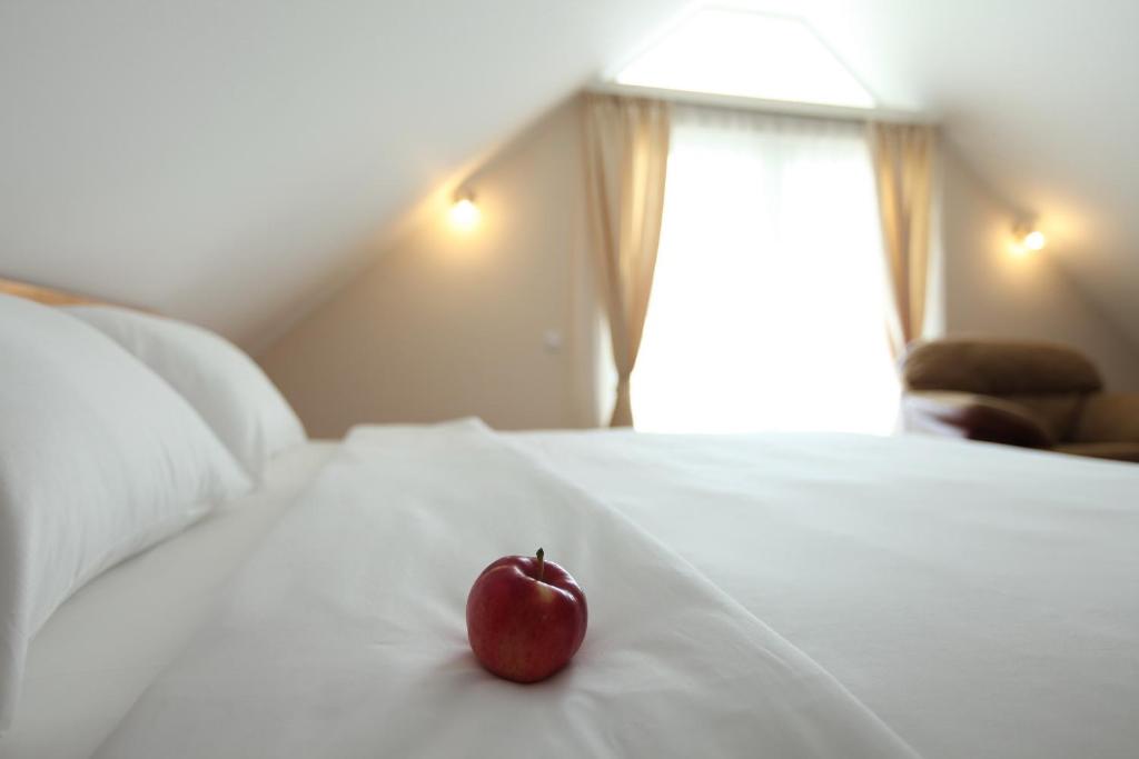 Postel nebo postele na pokoji v ubytování Hotel Novella Uno