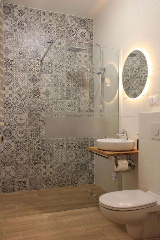 Koupelna v ubytování Apartamenty Ceglane