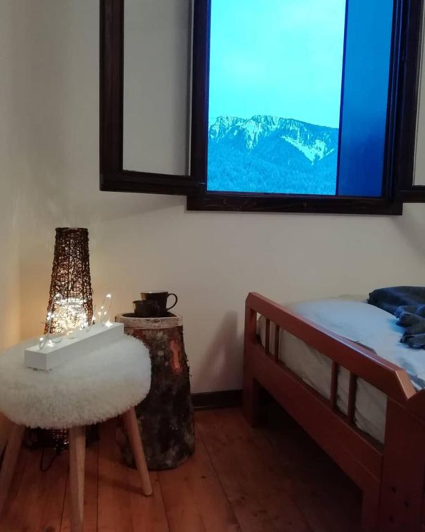 Postel nebo postele na pokoji v ubytování Elison-on the lake B&B