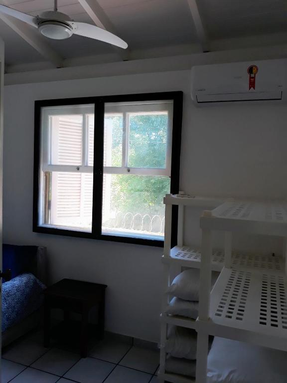 Postel nebo postele na pokoji v ubytování Casa em condomínio