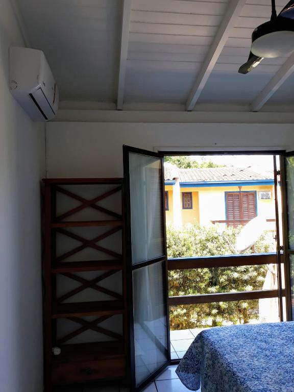 Postel nebo postele na pokoji v ubytování Casa em condomínio