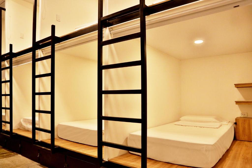 Postel nebo postele na pokoji v ubytování Santuario Getsemani Hostel