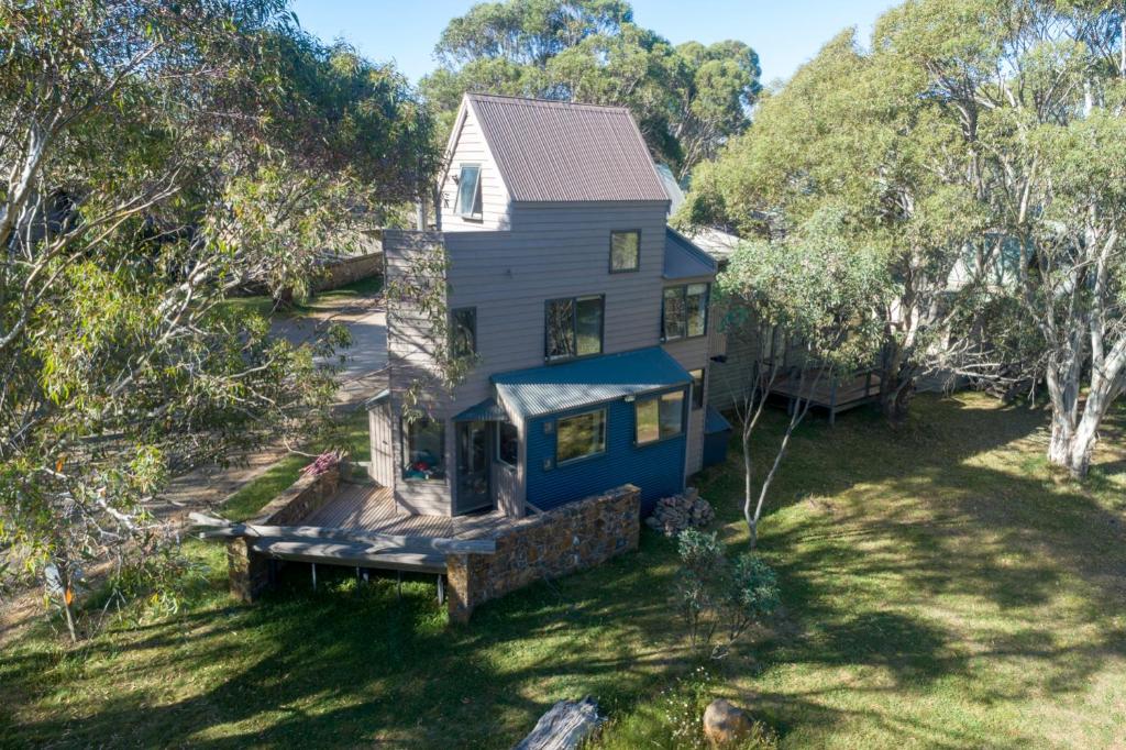 an aerial view of a house with a porch at Wedgetail in Dinner Plain