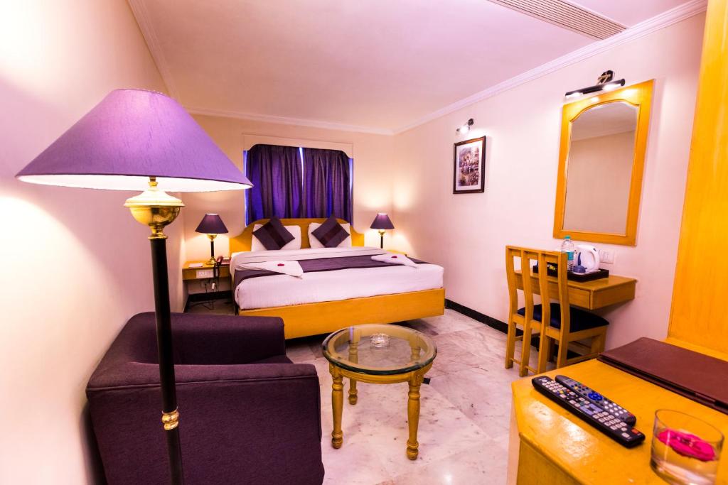 Postel nebo postele na pokoji v ubytování Hotel Grand Residence