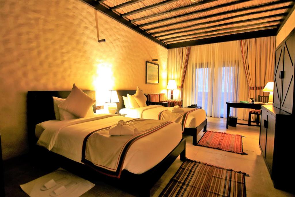 Postel nebo postele na pokoji v ubytování Atana Musandam Resort