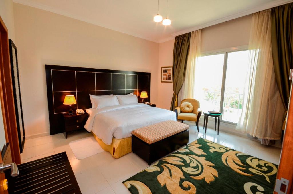 Postel nebo postele na pokoji v ubytování Coral Boutique Villas