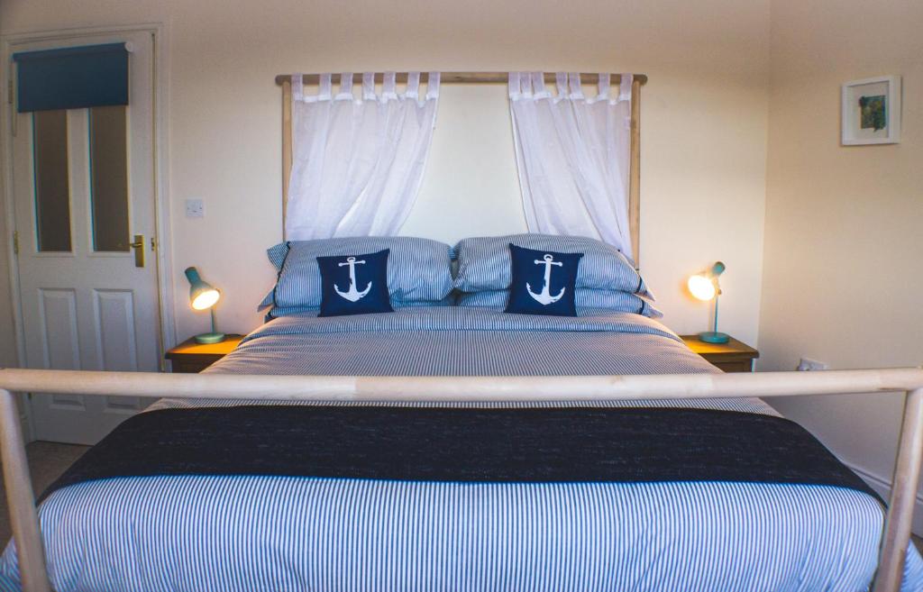 เตียงในห้องที่ Penmaenmawr Bed & Breakfast