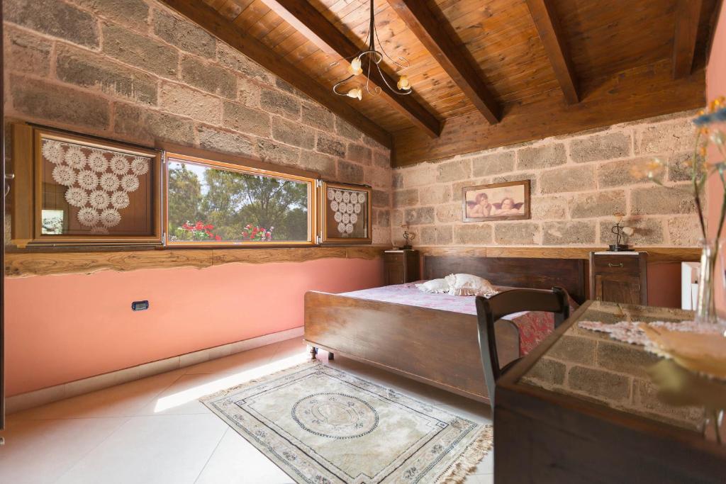 Łóżko lub łóżka w pokoju w obiekcie Villa Pizzi by Perle di Puglia