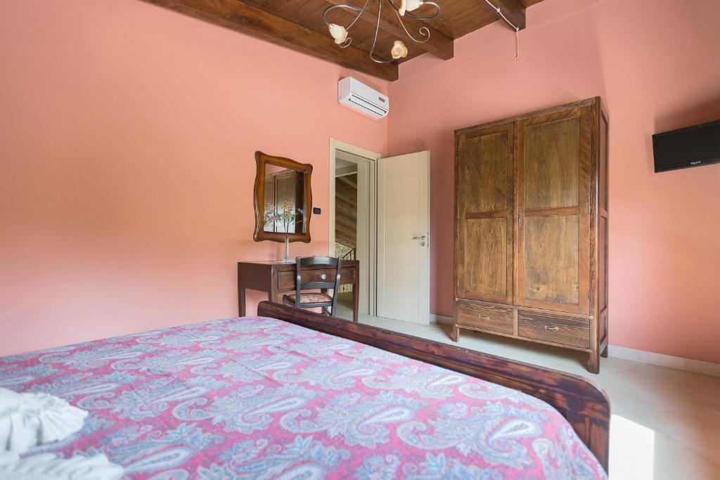 Łóżko lub łóżka w pokoju w obiekcie Villa Pizzi by Perle di Puglia