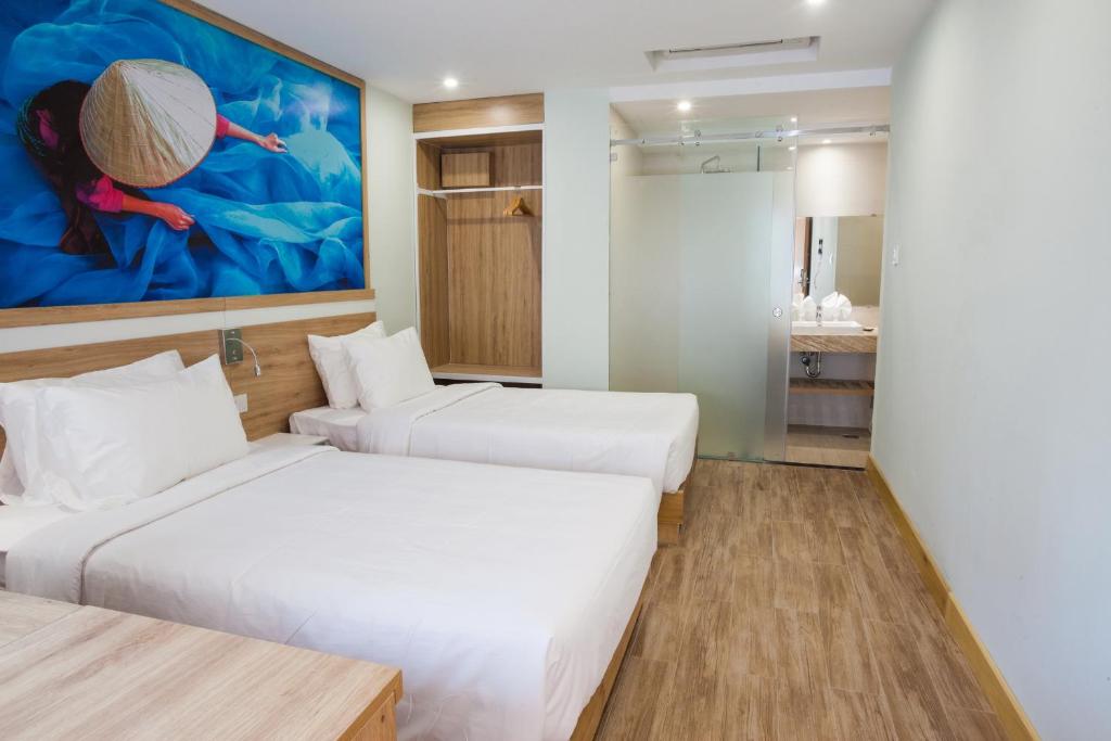 Phòng Deluxe (2 Người lớn + 1 Trẻ em)