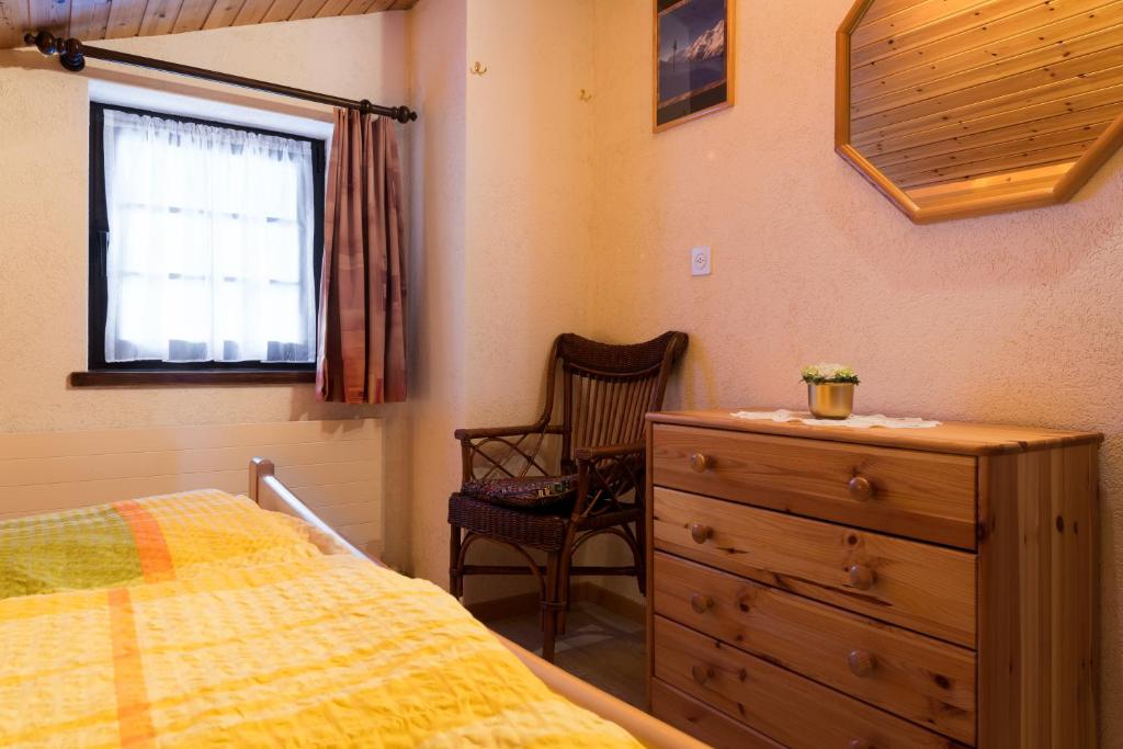 Postel nebo postele na pokoji v ubytování Apartments Orphelja