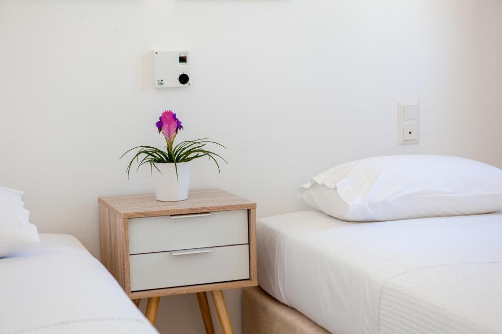 Postel nebo postele na pokoji v ubytování La Noi Houses