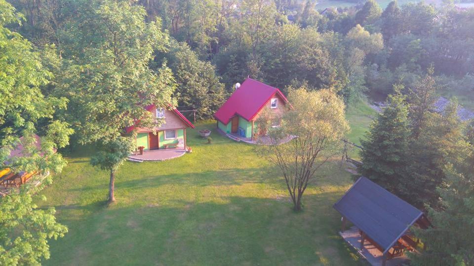 an aerial view of a house with a pink roof at Domki u Danki in Brenna