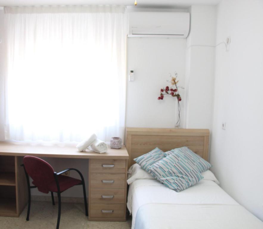 Ein Bett oder Betten in einem Zimmer der Unterkunft Balcón del Romeral