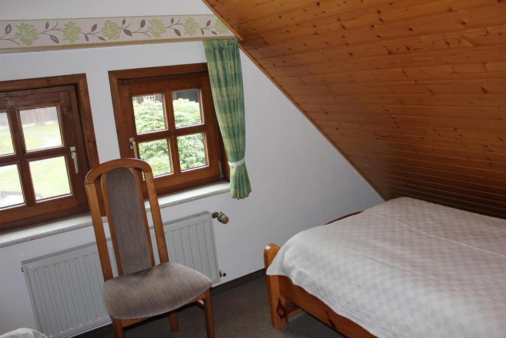 Postel nebo postele na pokoji v ubytování Tödter