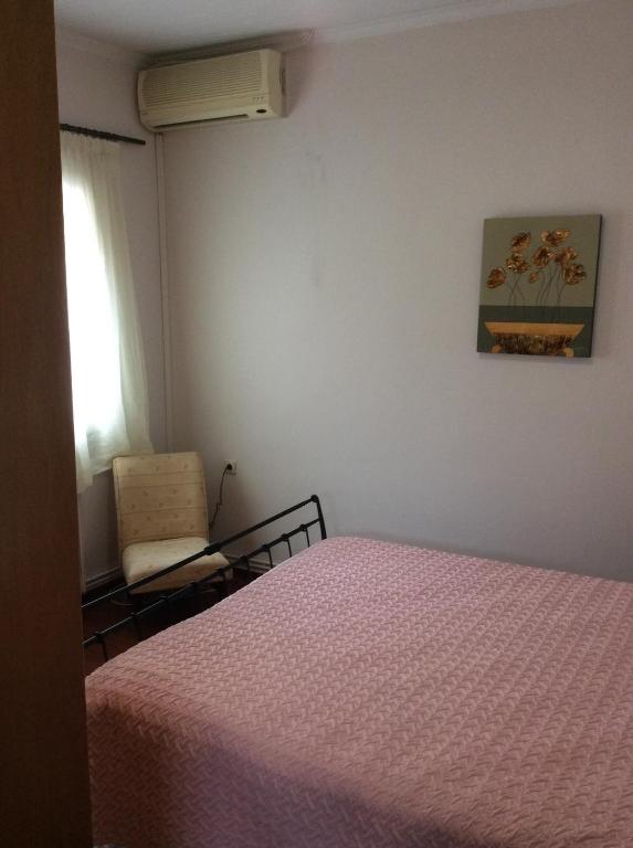 Postel nebo postele na pokoji v ubytování Apartment Gio III