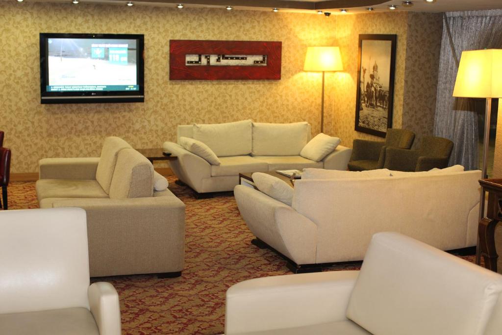 Un lugar para sentarse en Emir Royal Hotel