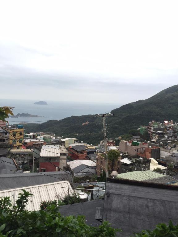 a view of a city with mountains in the background at TopHome 9 in Jiufen