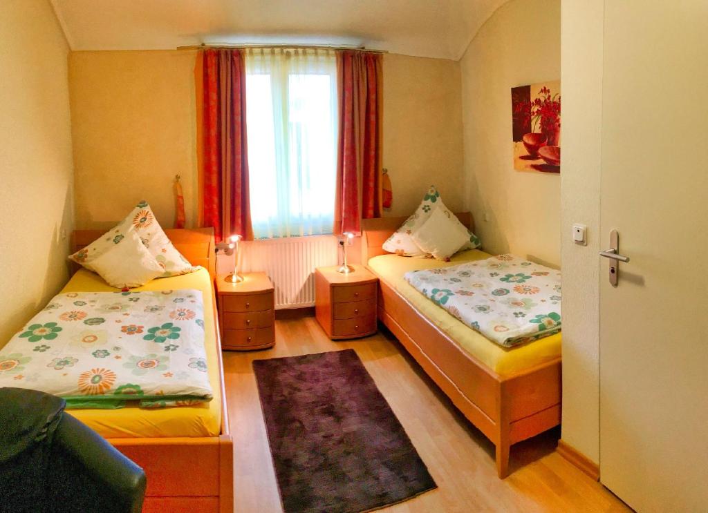 Postel nebo postele na pokoji v ubytování Hotel Maurer