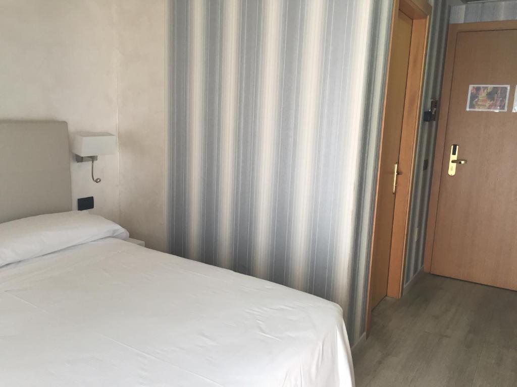 Postel nebo postele na pokoji v ubytování Hotel Parigi 2 & Spa