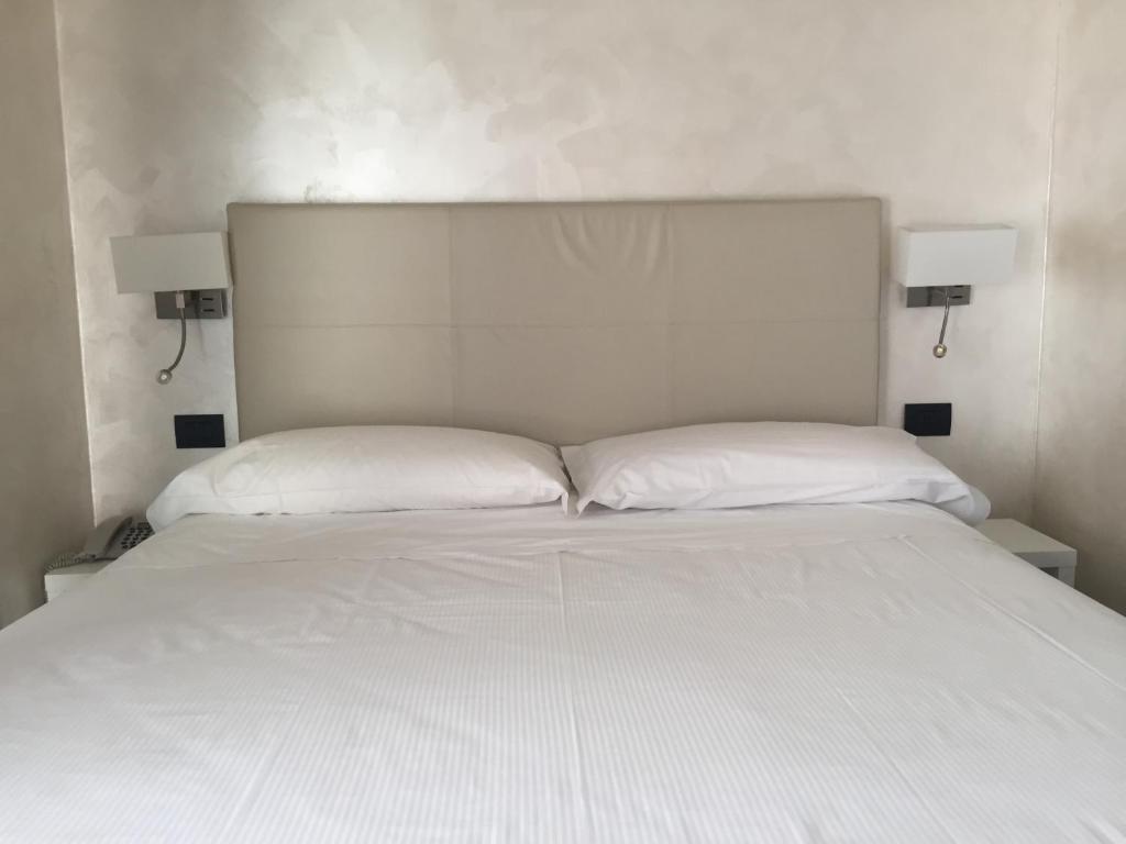 Postel nebo postele na pokoji v ubytování Hotel Parigi 2 & Spa