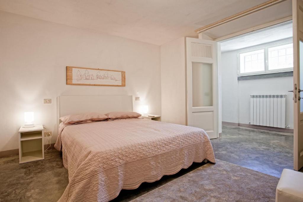 Łóżko lub łóżka w pokoju w obiekcie Villa Il Sole