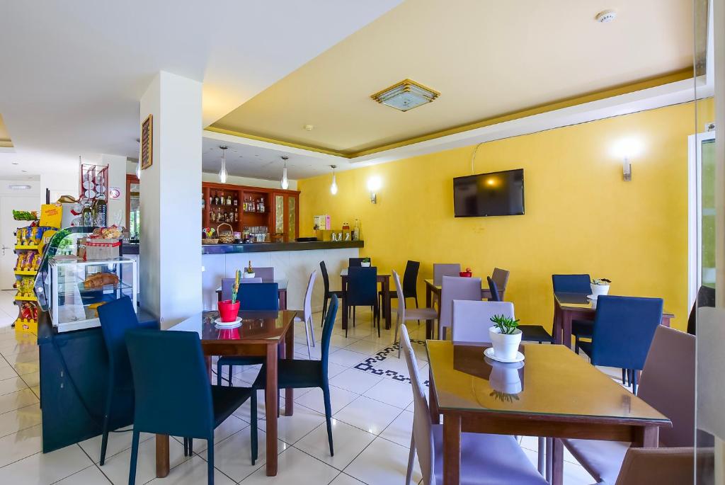 Posezení v ubytování Timos Hotel