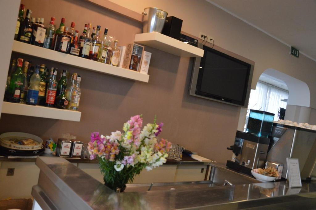 Kuchyň nebo kuchyňský kout v ubytování Hotel Sant'Elena