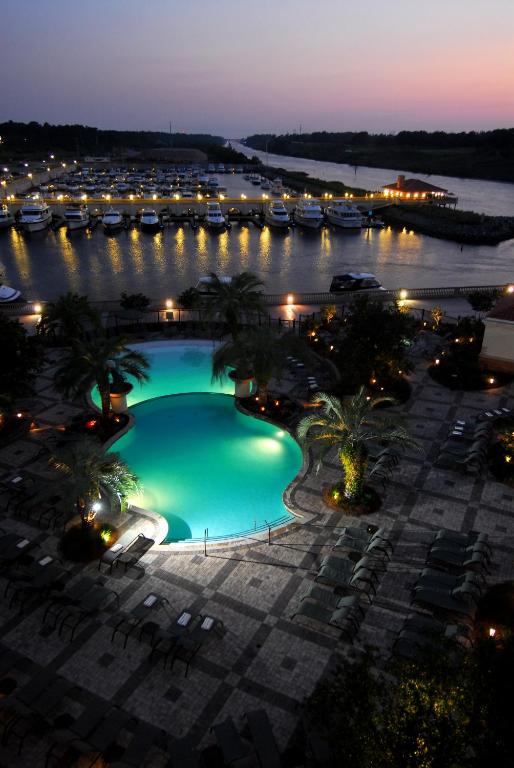 a swimming pool in a marina at night at Marina Inn at Grande Dunes in Myrtle Beach