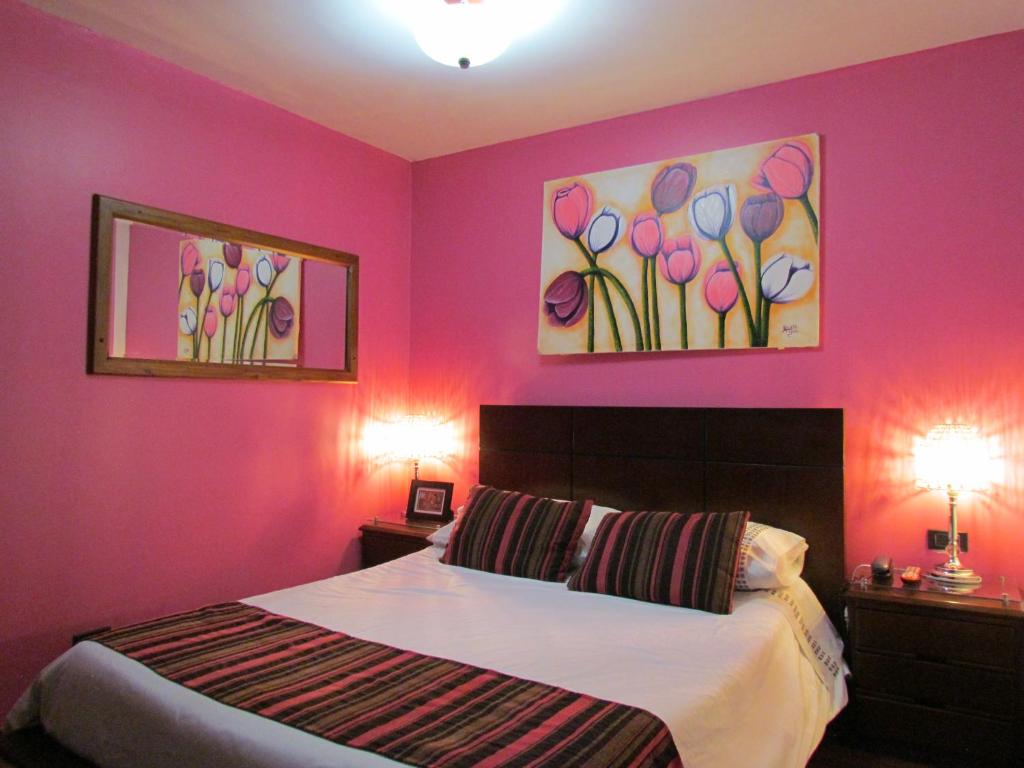 Postel nebo postele na pokoji v ubytování Hotel Apartasuite Normandia