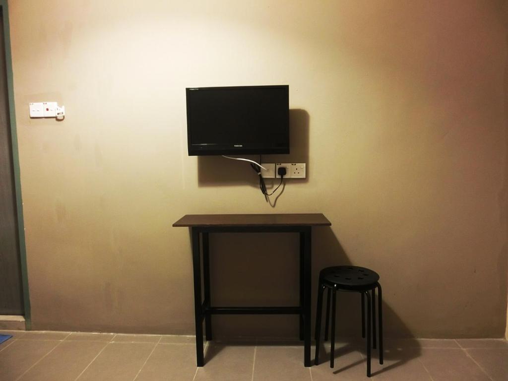 TV a/nebo společenská místnost v ubytování T Hotel