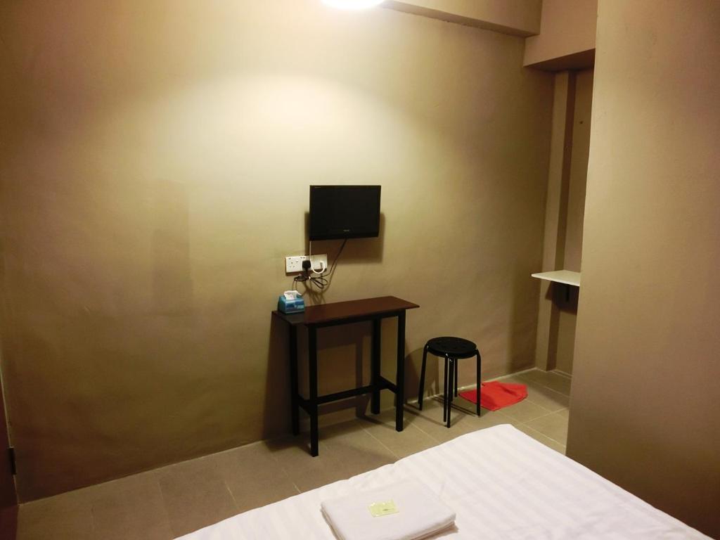 TV a/nebo společenská místnost v ubytování T Hotel