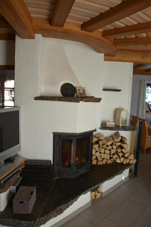 TV a/nebo společenská místnost v ubytování Ferienhaus Winterberg