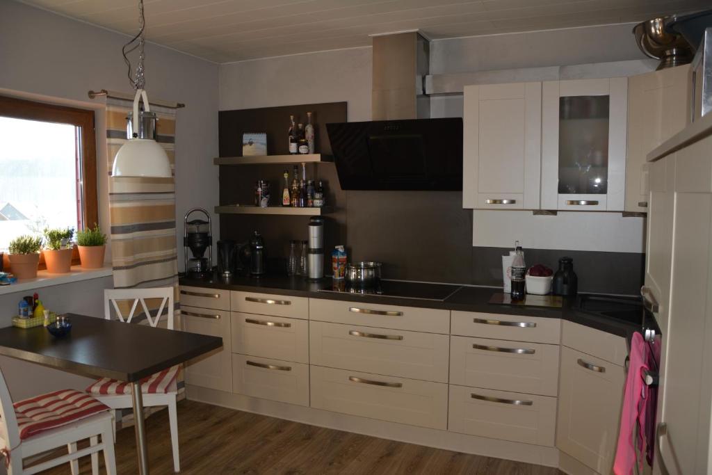 Kuchyň nebo kuchyňský kout v ubytování Ferienhaus Winterberg
