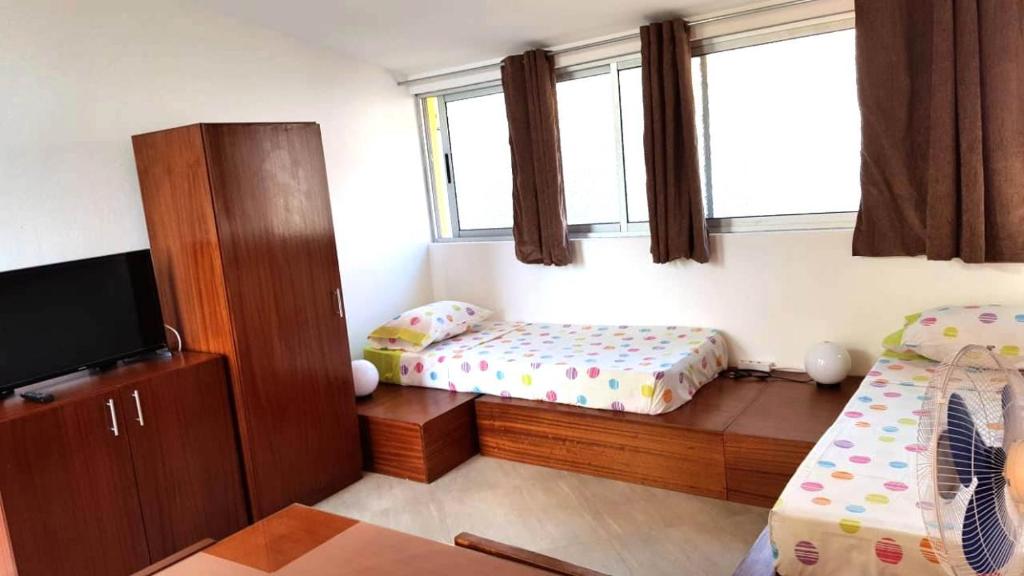 Postel nebo postele na pokoji v ubytování Basic Hotel