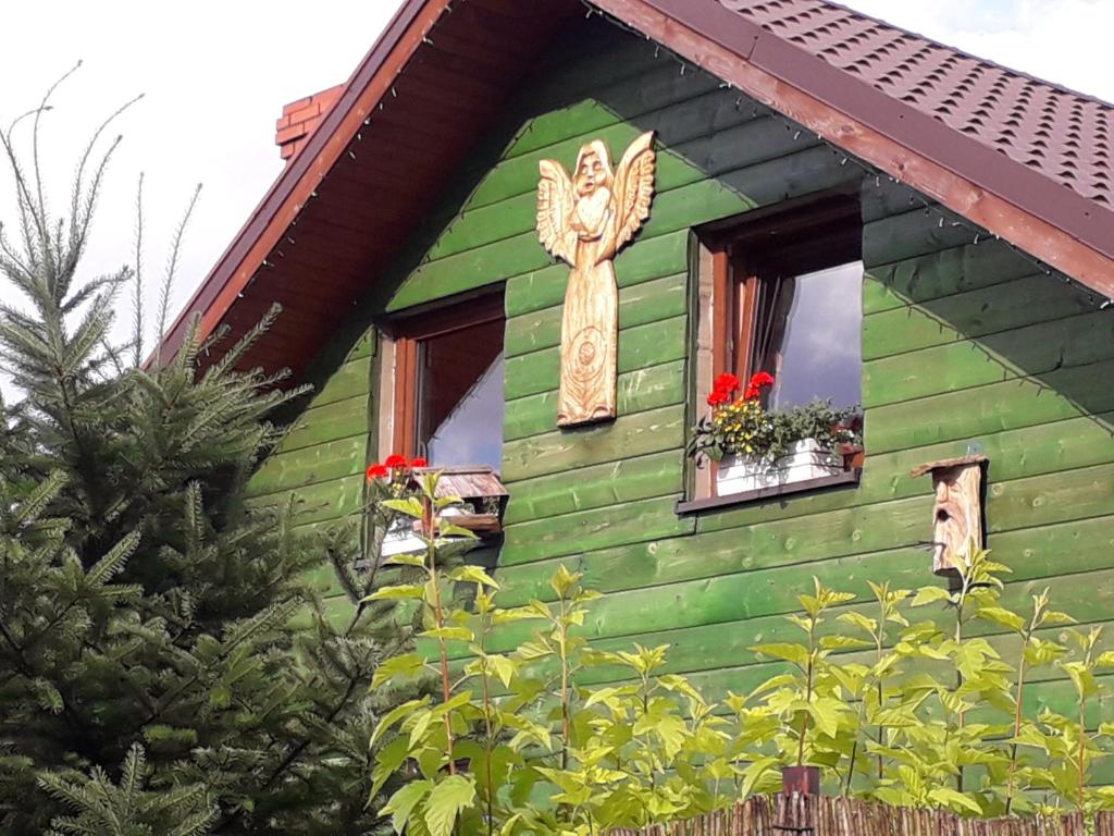 Vonkajšia záhrada v ubytovaní Rogate Anioły