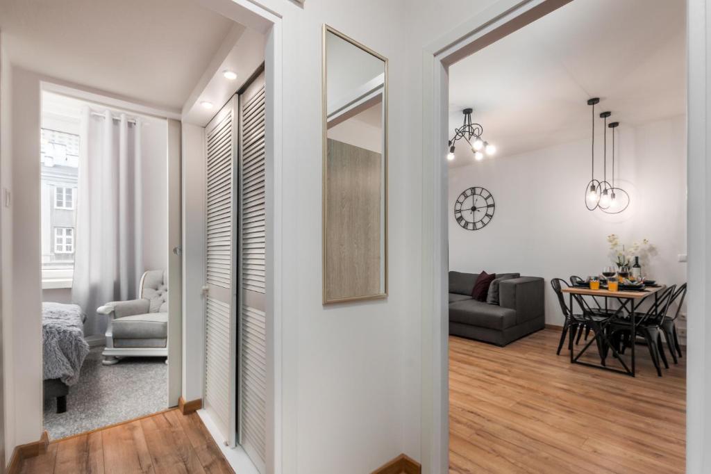 Posteľ alebo postele v izbe v ubytovaní Apartments Madelaine Warsaw by Noclegi Renters