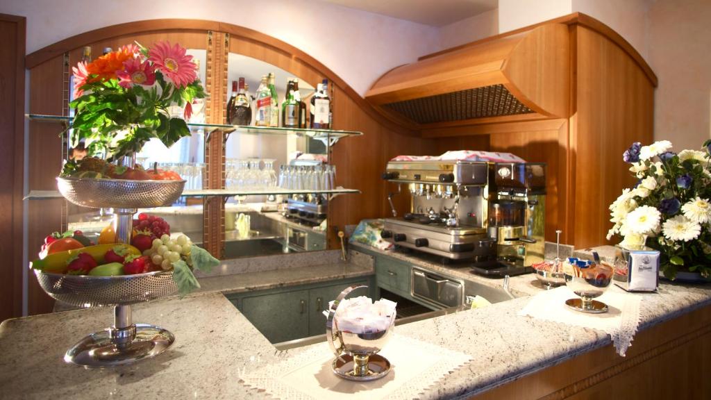 Kuchyň nebo kuchyňský kout v ubytování Hotel Feluca