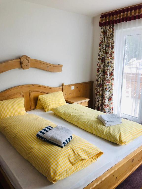 Postel nebo postele na pokoji v ubytování Garni-Appartement Collina